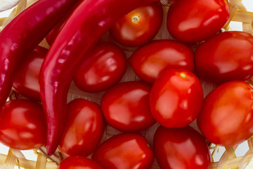 red set vegetable tomatoes cherry pepper hot chili close-up mini cherry design base