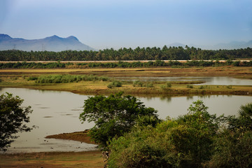 beautiful lake view with mountains in the distance in the south of india