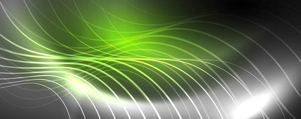 Shiny neon lights, dark abstract background with blurred magic neon light curved lines