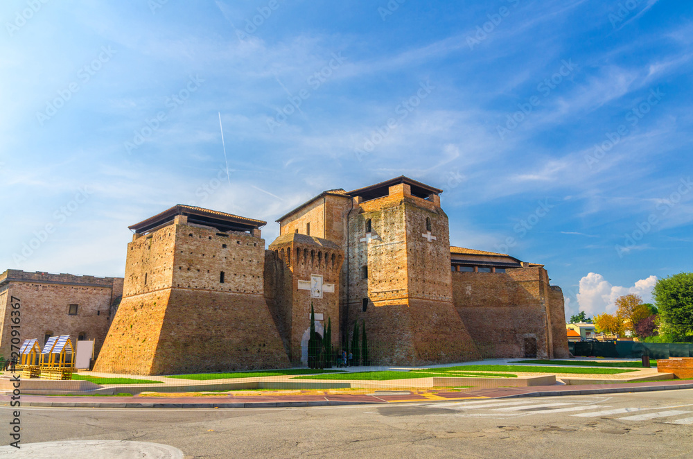 Wall mural castel sismondo brick castle with tower on piazza malatesta square in old historical touristic city 