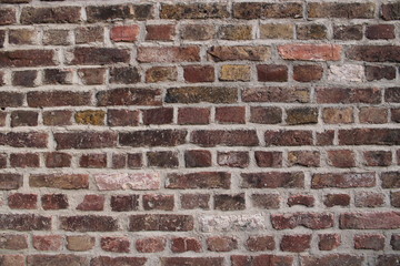 Rote alte Backstein Mauer