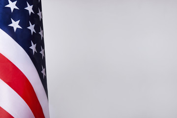 American flag on grey background with copy space. 