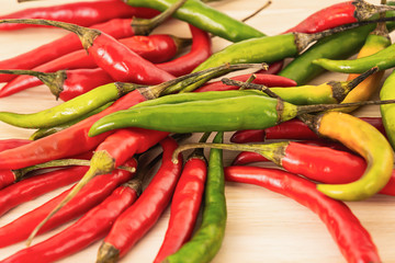 red green chile pepper spicy thin pod close-up vegetable background