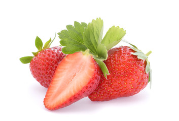 Red ripe strawberry halved and whole isolated on white
