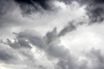 dramatic dark rainy cumulus clouds background