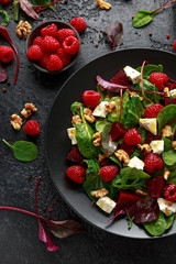 Healthy Beet Salad with raspberry, walnuts nuts and feta cheese