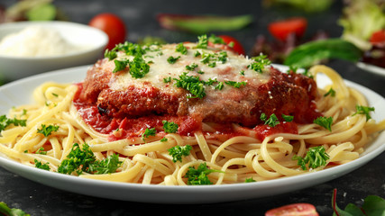 Chicken Parmesan with Cheese and Marinara Sauce served over spaghetti, pasta