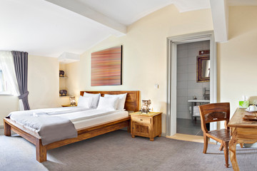 Luxurious modern loft bedroom interior with twin bed