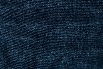 Blue Navy jeans fabrics background, The Close up blue jeans texture.