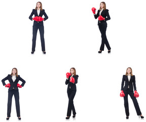 Businesswoman with boxing gloves isolated on white 