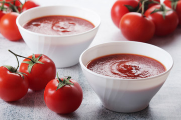 Two plates with gazpacho - traditional Spanish tomato soup