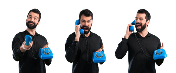 Set of Handsome man with beard talking to vintage phone