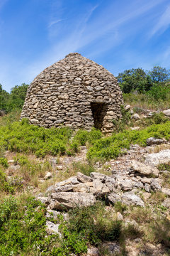 Salon, France. 05-30-2019- Old stone building called Borie, at the Tallagard mountain near Salon de Provence France.