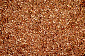 Flax seeds background. Natural grain with antioxidants or superfood.