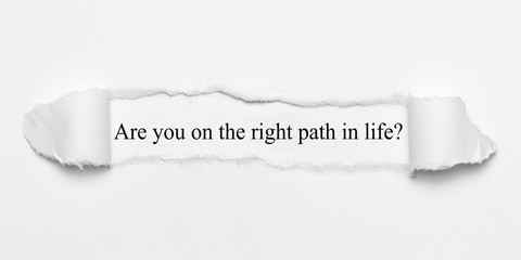 Are you on the right path in life? on white torn paper