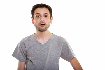 Fototapeta premium Studio shot of young man looking shocked