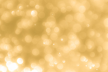 abstract golden background with light bokeh effect