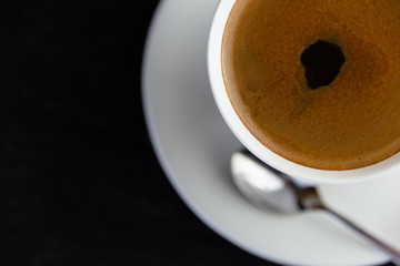 View from above of a delicious and tasty cup of freshly made coffee
