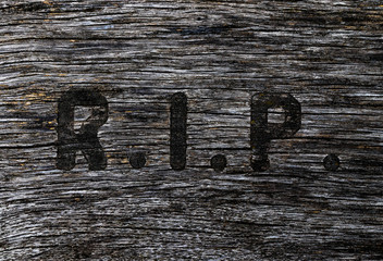 R.I.P. wooden inscription
