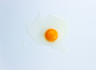 Broken egg isolated on white background.
