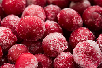 Group Of Frozen Cherries on a dark background Close Up. 