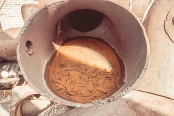 rusty water stands in the old pipeline