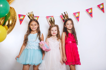 Group of funny kids celebrate birthday party together