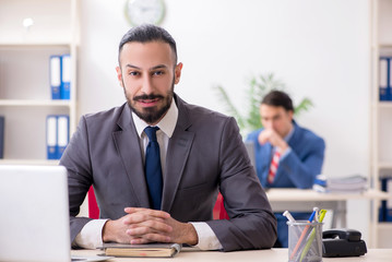 Two male colleagues in the office 