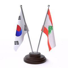 South Korea and Lebanon, two table flags isolated on white background. 3d image