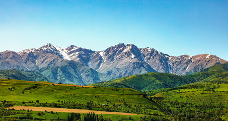 Fototapeta premium Beautiful mountains and fields panorama