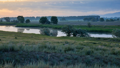 Fototapeta premium landscape with river and clouds