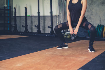 Young asian women exercise workout in the gym.