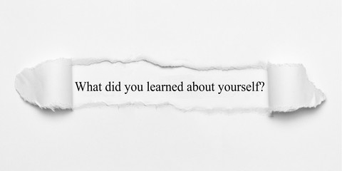 What did you learned about yourself? on white torn paper