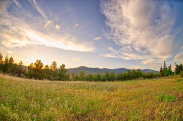 Athens Greece summer on mountain, purple and blue cloudy sunset sky scene 