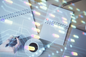 Multi exposure of woman's writing hand on background with data technology hud. Concept of...