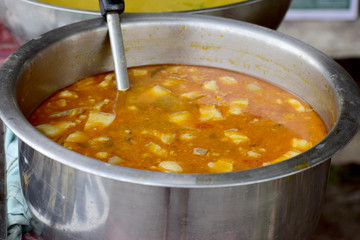 Thai food, pork curry in aluminum pots