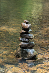 stacked of stone at the waterway