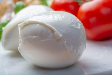 Balls of buffalo mozzarella, soft Italian scheese made from the milk of Italian Mediterranean buffalo