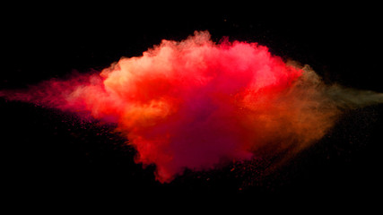 Collision of colored powder isolated on black