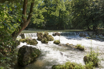 Water of the isar in The English Garden, Munich, Germany.