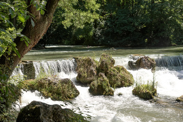 Water of the isar in The English Garden, Munich, Germany.