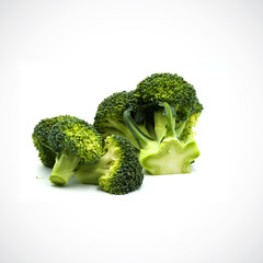 Broccoli separate pieces  on the white blackground