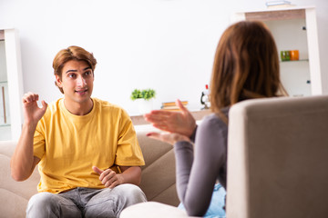Woman and man learning sign language
