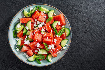 Summer salad with watermelon and cucumbers - Powered by Adobe