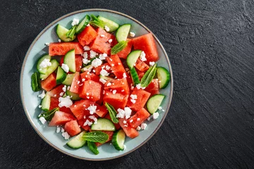 Fotobehang Summer salad with watermelon and cucumbers © nerudol
