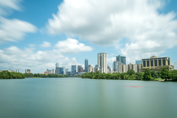 Fototapeta na wymiar Austin Skyline From Lady Bird Lake With Cloudy Skies