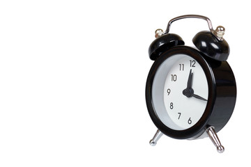 Black retro alarm clock, classic watches with bells.