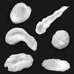 Realistic white smears foam, gel or cream isolated on black background. Set of vector objects different forms.