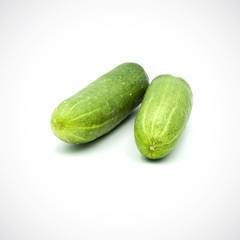 Two cucumbers on a white background