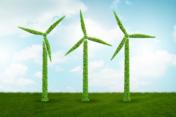 Windmills in ecological power generation and production concept - 3d rendering